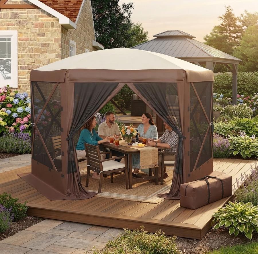 Beige pop-up canopy tent on sideline grass with folding chairs underneath